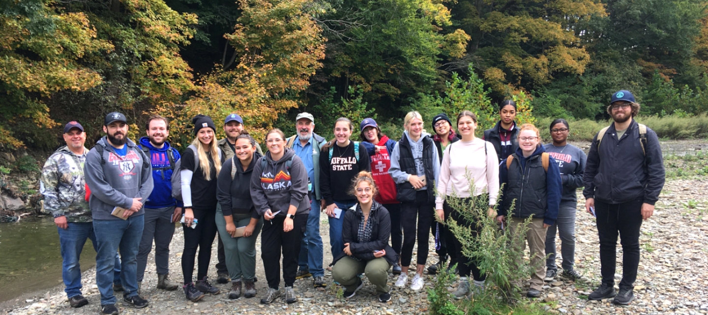 Group of faculty and students outside